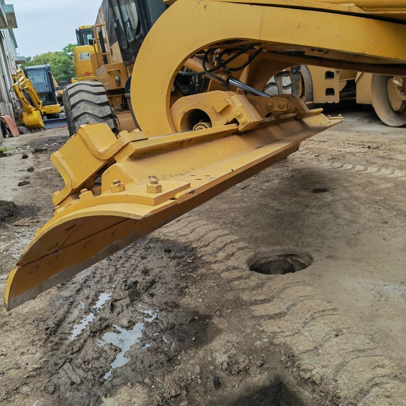 ماشین حفاری استفاده شده زمین تراش Caterpillar CAT140K ماشین جاده ای دست دوم موتور تراکتور ژاپن در وضعیت خوب